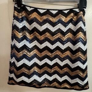 umgee mini skirt size large
 Sequin Mini Skirt - Black, Gold, White new no tag